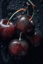 Three cherries on a black surface with water droplets. Generative AI image.