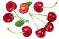 Three cherries with leaf closeup isolated on white background Royalty Free Stock Photo