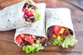 Three chicken burritos