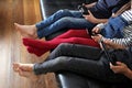 Three children playing with electronic devices - tablet, smartphone and games controller Royalty Free Stock Photo