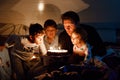 Three children, toddler girl and two school kids boys congratulating father to his birthday. Baby sister child, two Royalty Free Stock Photo