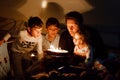 Three children, toddler girl and two school kids boys congratulating father to his birthday. Baby sister child, two Royalty Free Stock Photo