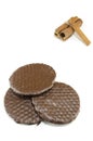 Three chocolate biscuits and cinnamon sticks isolated Royalty Free Stock Photo