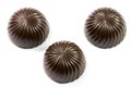 Three chocolate candies isolated on white background Royalty Free Stock Photo