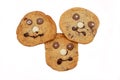 Three home made, decorated chocolate chip cookies Royalty Free Stock Photo