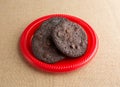 Three chocolate chip crispy brownie cookies on plate Royalty Free Stock Photo