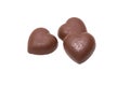Three chocolate heart candy on white background Royalty Free Stock Photo