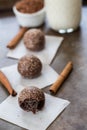 Three Chocolate Truffles with Cinnamon Sticks Royalty Free Stock Photo