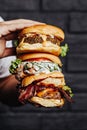 Three choices of tasty homemade burger. Healthy falafel burger, savory grilled chicken, and meaty angus beef burger. Perfect choic Royalty Free Stock Photo