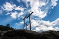 Three Christian crosses on blue sky with clouds Royalty Free Stock Photo