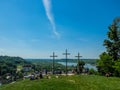 Three christian crosses on the hill with people en Royalty Free Stock Photo
