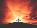 Three Christian Easter Crosses on Hill of Calvary with Colorful Clouds in Sky Royalty Free Stock Photo