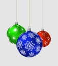 Three Christmas balls with different patterns Royalty Free Stock Photo