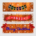 Three Christmas banners with inscriptions of welcome, 2017 and Happy Christmas. Wood texture Royalty Free Stock Photo