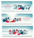 Three Christmas banners with presents. Royalty Free Stock Photo