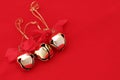 Three Christmas Bells on Red (left) Royalty Free Stock Photo