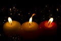 Three Christmas candles Royalty Free Stock Photo