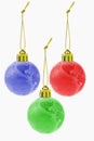 Three Christmas colorful globe ornaments