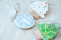 Three Christmas gingerbread cookies in the different shapes close-up. Selective focus, bokeh. Royalty Free Stock Photo