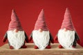 three Christmas gnomes with white beards