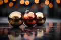 three christmas ornaments sitting on the ground Royalty Free Stock Photo