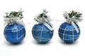 Three christmas spheres of dark blue color Royalty Free Stock Photo