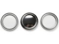 Three circular metal objects, isolated on white background Royalty Free Stock Photo
