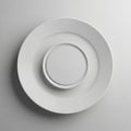 Three circular white plates of varying sizes arranged concentrica Royalty Free Stock Photo