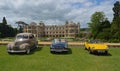 Three classic cars on show at Audley end House.