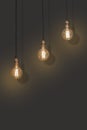 Three classic Edison lights bulb isolated on black background with space Royalty Free Stock Photo