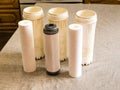 Three clean water filters. Replacing multi-stage water filter cartridges