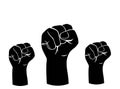 Three clenched fists raised up Royalty Free Stock Photo