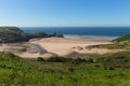 Three Cliff Bay the Gower Wales uk in summer sunshine Royalty Free Stock Photo