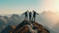 Three Climbers on Mountain Summit Celebrating Victory in UHD Royalty Free Stock Photo