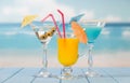 Three cocktails with umbrellas Royalty Free Stock Photo