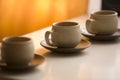 Three coffee cups and saucers Royalty Free Stock Photo