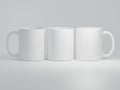 Three Coffee Mugs on a White Background Royalty Free Stock Photo