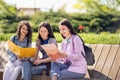 Three collage girls studying outside Royalty Free Stock Photo