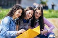 Three collage girls studying outside Royalty Free Stock Photo