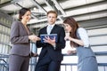 Three colleagues discussing in office