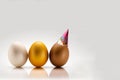 three color eggs with bithday hat Royalty Free Stock Photo