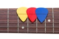 Three color mediators on a guitar fingerboard Royalty Free Stock Photo