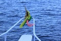 Three colored cloth tied to the boat. Royalty Free Stock Photo