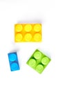 Three colored constructor elements for kids.