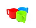 Three colored cups. Coffee cups. 3D illustration. Royalty Free Stock Photo