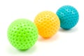 Three colored golf balls Royalty Free Stock Photo