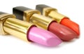 Three colored lipsticks Royalty Free Stock Photo