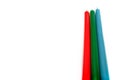 Three colored pencils. The colors red, green and blue. The concept of polygraphy and digital RGB color transfer Royalty Free Stock Photo