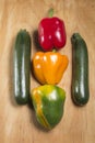 Three peppers and two zucchini Royalty Free Stock Photo