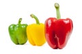Three colored peppers on white background Royalty Free Stock Photo
